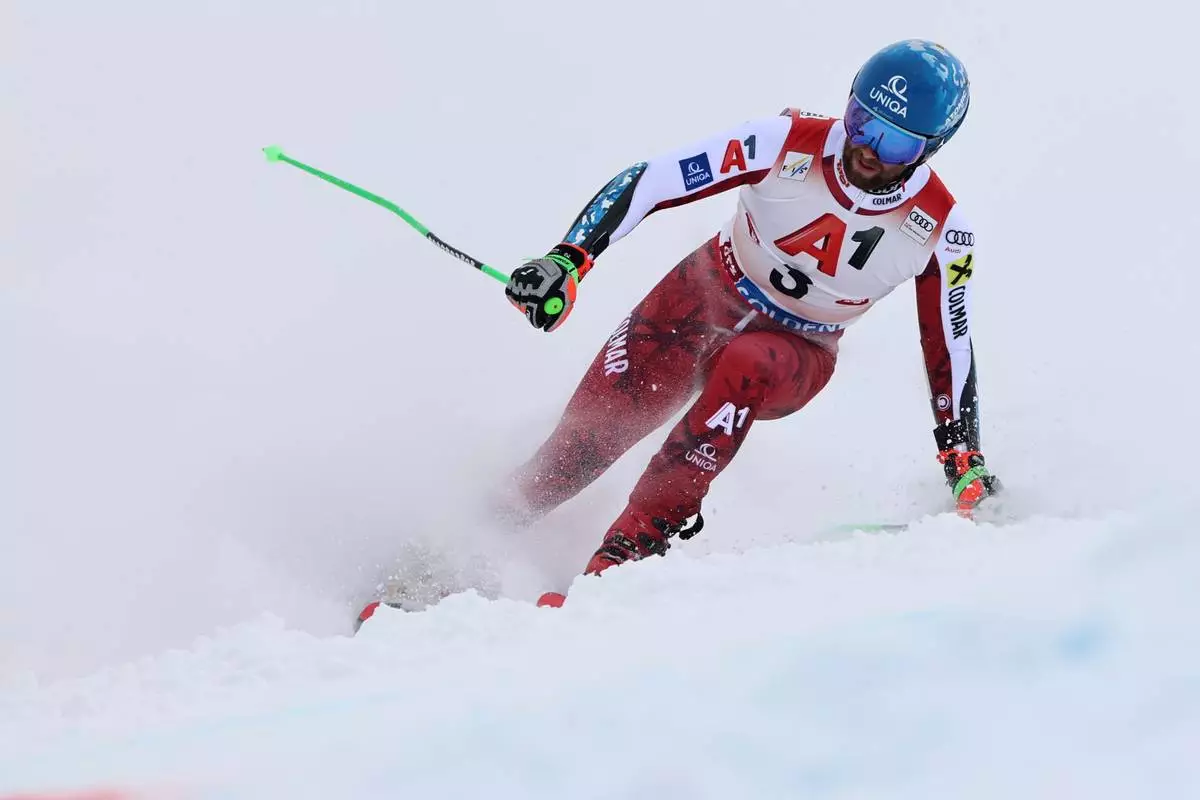 Austria's Marco Schwarz skis off course during an alpine ski, men's World Cup giant slalom, in Soelden, Austria, Sunday, Oct. 25, 2026. (AP Photo/Marco Trovati)