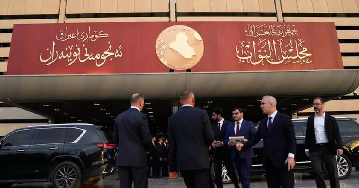 Iraq parliament fills Cabinet posts, naming a US-sanctioned deputy prime minister