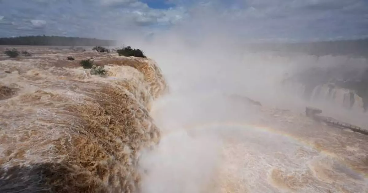 El Niño rains flood South America, sending residents fleeing and cattle swimming