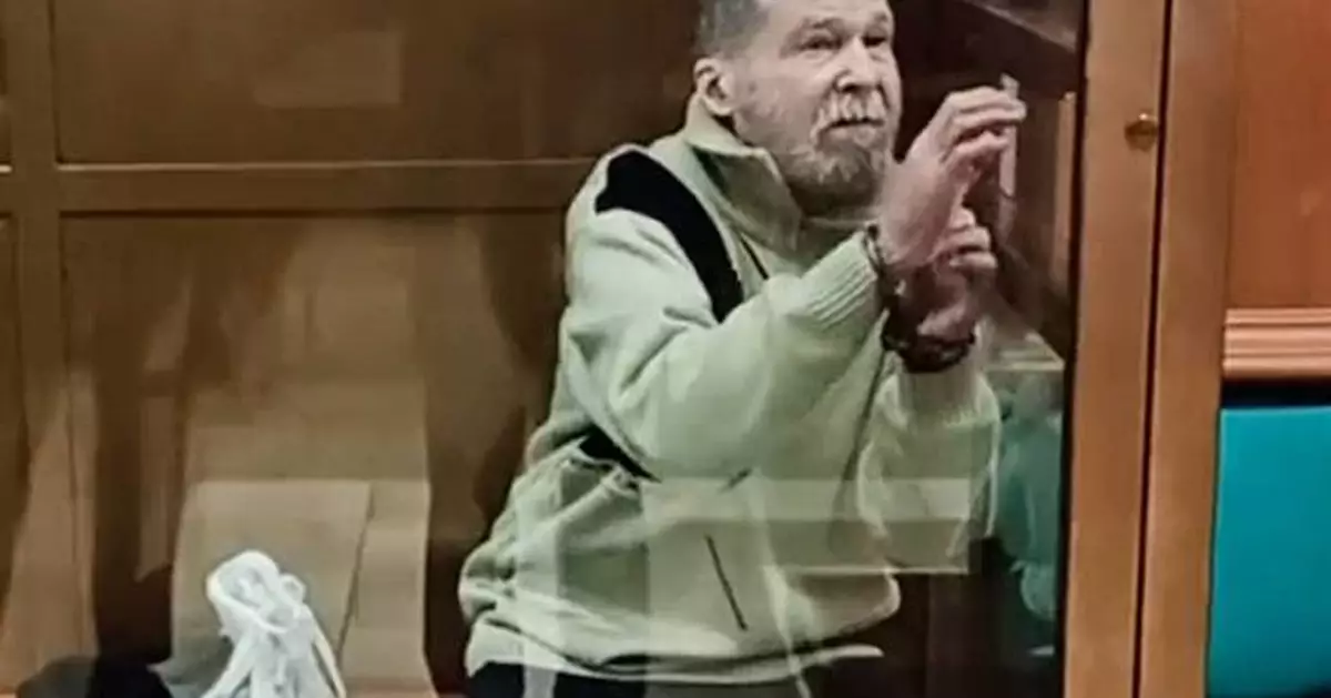 Sister of American held in Russia says he didn't know he was being released until he saw US flag