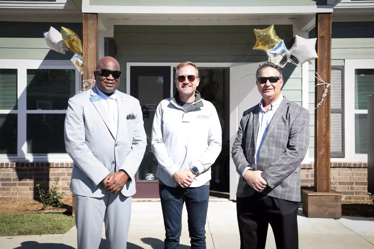 From left to right: Virgil Miller, Arvest Group CRA director; Matthew Darst, principal of Upward Housing Group; and Steven Matkovich, AHP General Fund manager at FHLB Dallas at the grand opening of Harrison Estates Senior Housing in Harrison, Arkansas, the first affordable senior housing development in the community in more than a decade.
