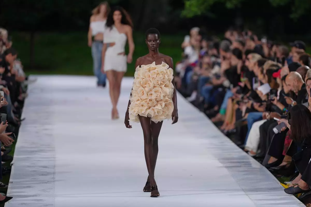 A model wears a creation as part of the Stella McCartney Womenswear Spring Summer 2027 collection presented in Paris, France, Wednesday, Sept. 30, 2026. (AP Photo/Aurelien Morissard)