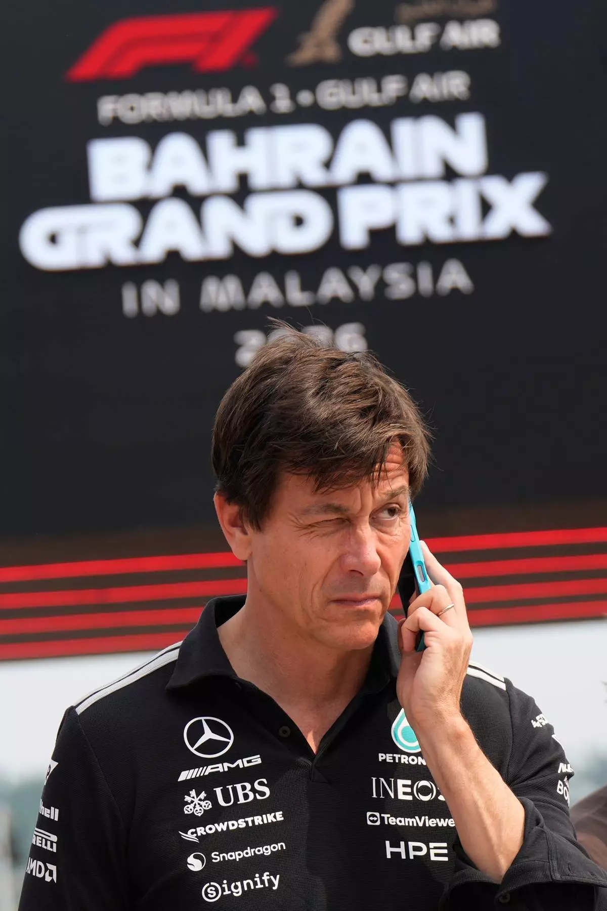 Mercedes team principal Toto Wolff arrives at the track ahead of the Bahrain Grand Prix in Sepang, Malaysia, Sunday, Oct. 4, 2026. (AP Photo/Aijaz Rahi)