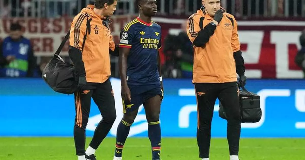 Arsenal forward Bukayo Saka forced off early with leg injury against Bayern Munich
