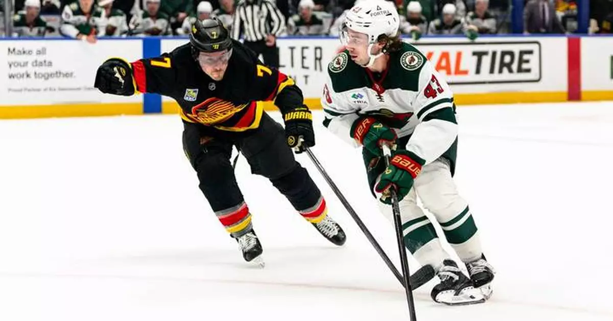 Quinn Hughes has a goal and an assist in his Vancouver return in Wild's 4-2 victory