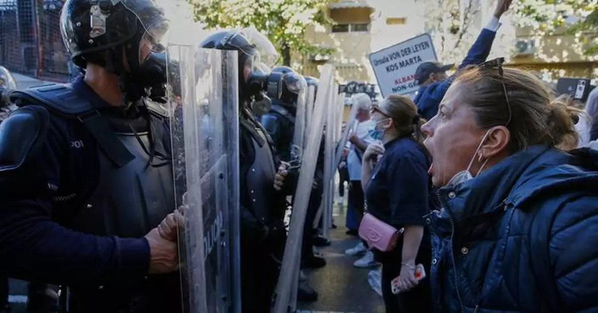 Albanian police clash with anti-government protesters for an 8th day