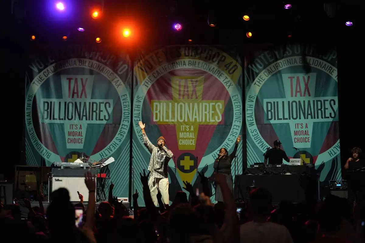 Rapper Common performs during a campaign rally in support of California Proposition 40, known as the billionaire tax, in Los Angeles, Monday, Oct. 5, 2026. (AP Photo/Jae C. Hong)