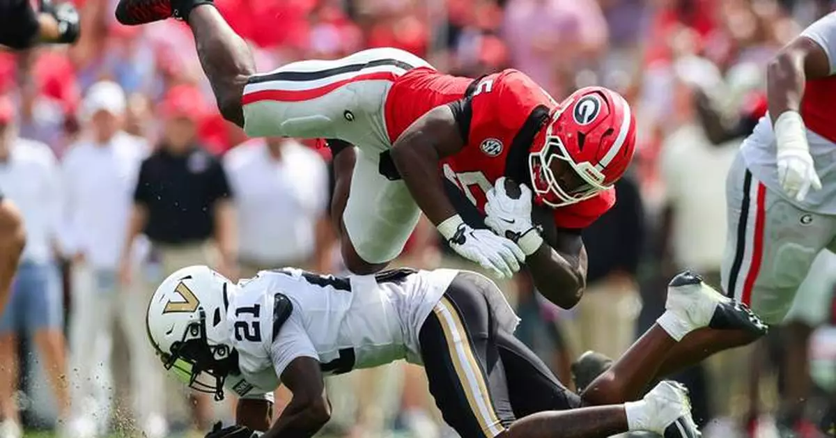 Stockton throws 3 TDs as No. 2 Georgia rolls past Vanderbilt 38-14  and improves to 5-0