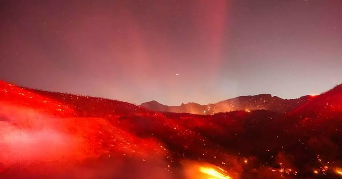 Hot, windy weather stokes brush fires in Southern California; power turned off for many