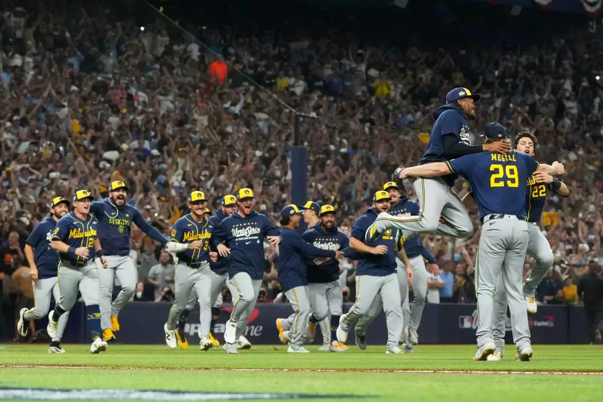 The Milwaukee Brewers celebrate after winning baseball's World Series against the Tampa Bay Rays, Wednesday, Oct. 28, 2026, in St. Petersburg, Fla. (AP Photo/Ashley Landis)