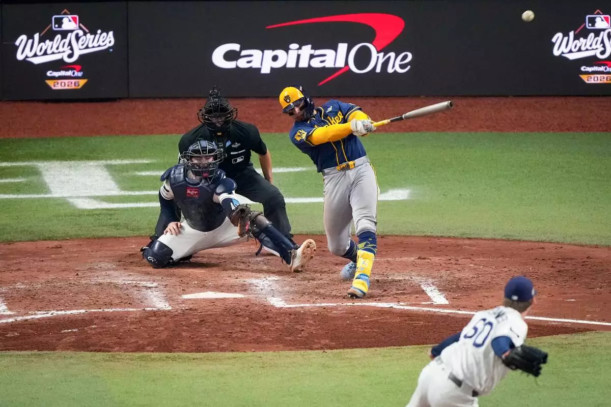 Milwaukee Brewers catcher William Contreras follows through on an RBI double off Tampa Bay Rays pitcher Garrett Cleavinger during the sixth inning of Game 5 of baseball's World Series, Wednesday, Oct. 28, 2026, in St. Petersburg, Fla., between the Milwaukee Brewers and the Tampa Bay Rays. (AP Photo/Morry Gash)