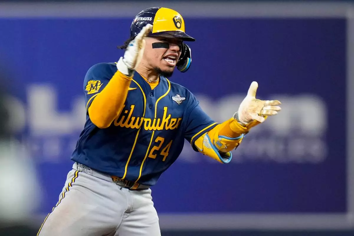 Milwaukee Brewers catcher William Contreras celebrates his RBI double during the sixth inning of Game 5 of baseball's World Series, Wednesday, Oct. 28, 2026, in St. Petersburg, Fla., between the Milwaukee Brewers and the Tampa Bay Rays. (AP Photo/Chris O'Meara)