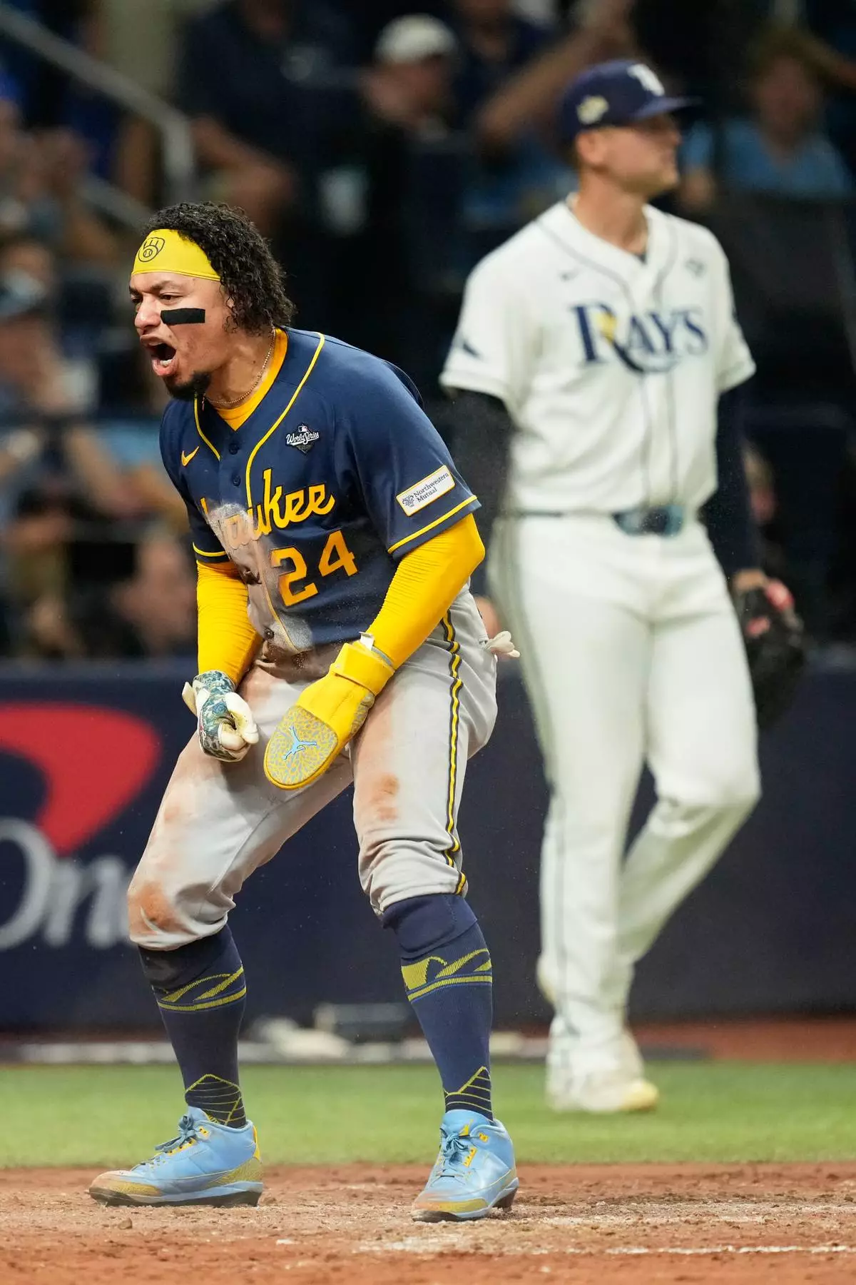 Milwaukee Brewers' William Contreras celebrates after scoring during the sixth inning of Game 5 of baseball's World Series, Wednesday, Oct. 28, 2026, in St. Petersburg, Fla., between the Milwaukee Brewers and the Tampa Bay Rays. (AP Photo/Ashley Landis)