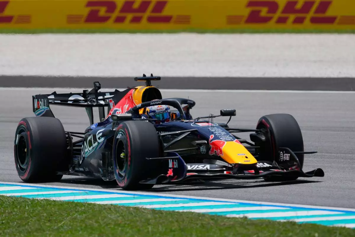 Red Bull driver Max Verstappen of the Netherlands steers his car during the first free practice session ahead of the Bahrain Grand Prix in Sepang, Malaysia, Friday, Oct. 2, 2026. (AP Photo/Vincent Thian)