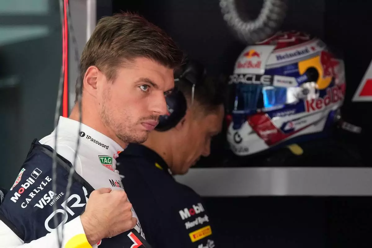 Red Bull driver Max Verstappen of the Netherlands prepares for the first free practice session of the Bahrain Grand Prix in Sepang, Malaysia, Friday, Oct. 2, 2026. (AP Photo/Aijaz Rahi)
