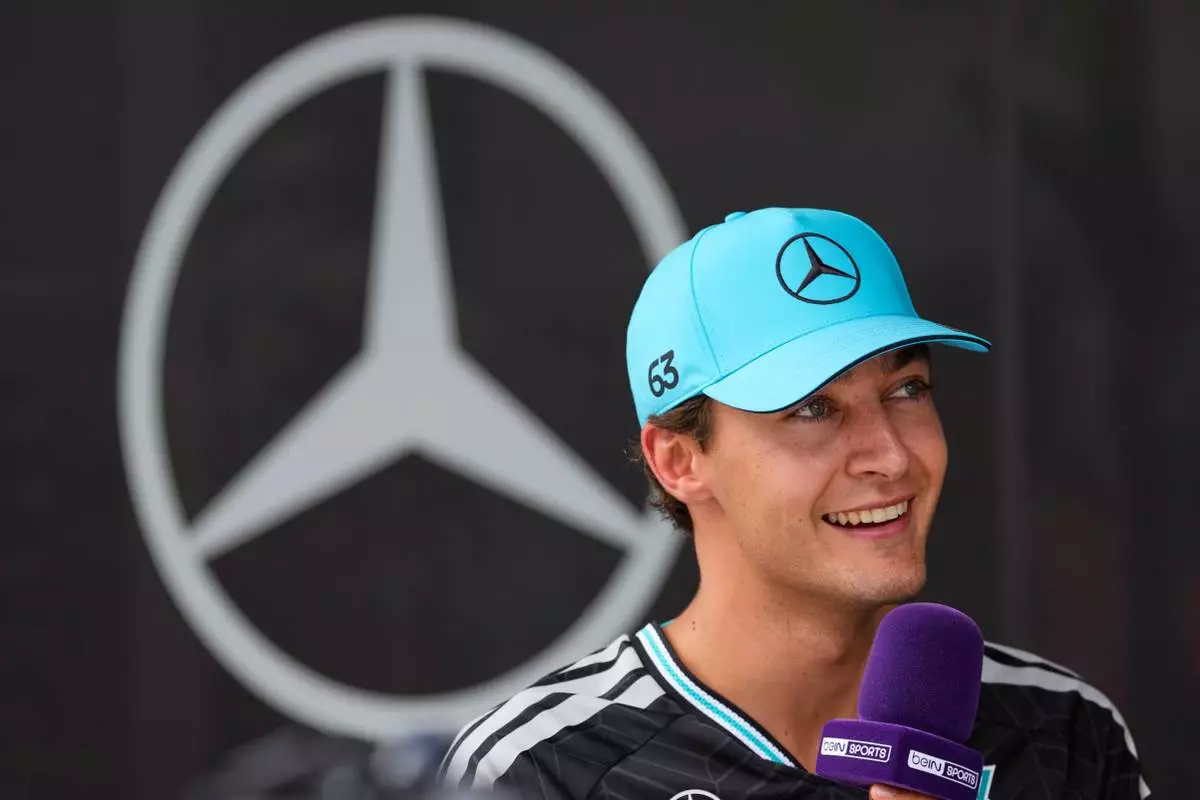 Mercedes driver George Russell of Britain speaks during an interview outside the paddock ahead of the Bahrain Grand Prix in Malaysia at the Sepang International Circuit in Sepang, Malaysia, Thursday, Oct. 1, 2026. (AP Photo/Vincent Thian)