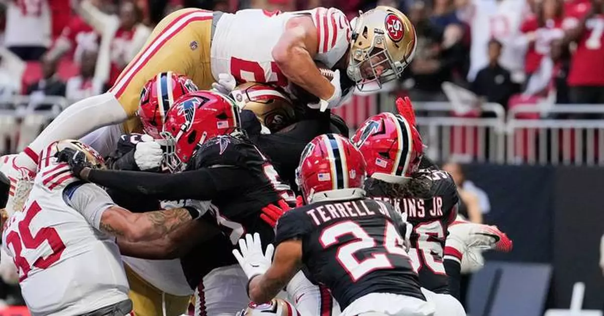 49ers star McCaffrey sustains thigh injury, but returns to field against Falcons