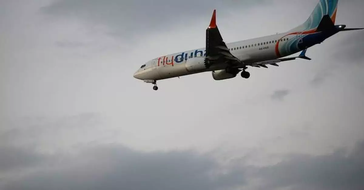 Who are the mystery men who stepped in to keep the FlyDubai plane from crashing?