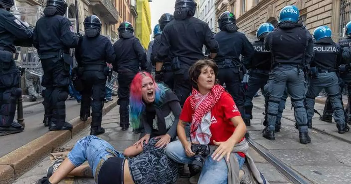Rioters loot stores, set fires in central Milan during cost-of-living protest