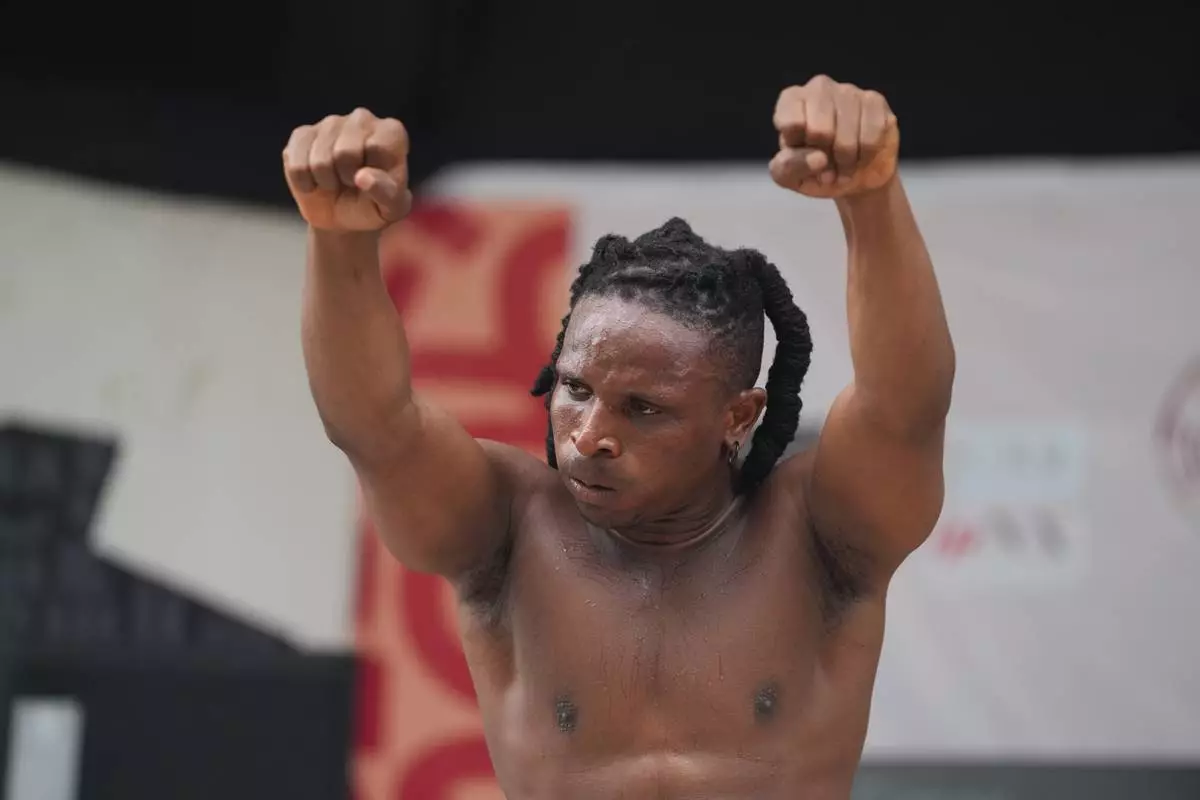 Benjamin Daniel, known as Ben Dancer, attempts dancing for 168 hours in a bid to set a Guinness World Record, at the freedom park in Lagos, Nigeria, Tuesday, Sept. 29, 2026. (AP Photo/Sunday Alamba)
