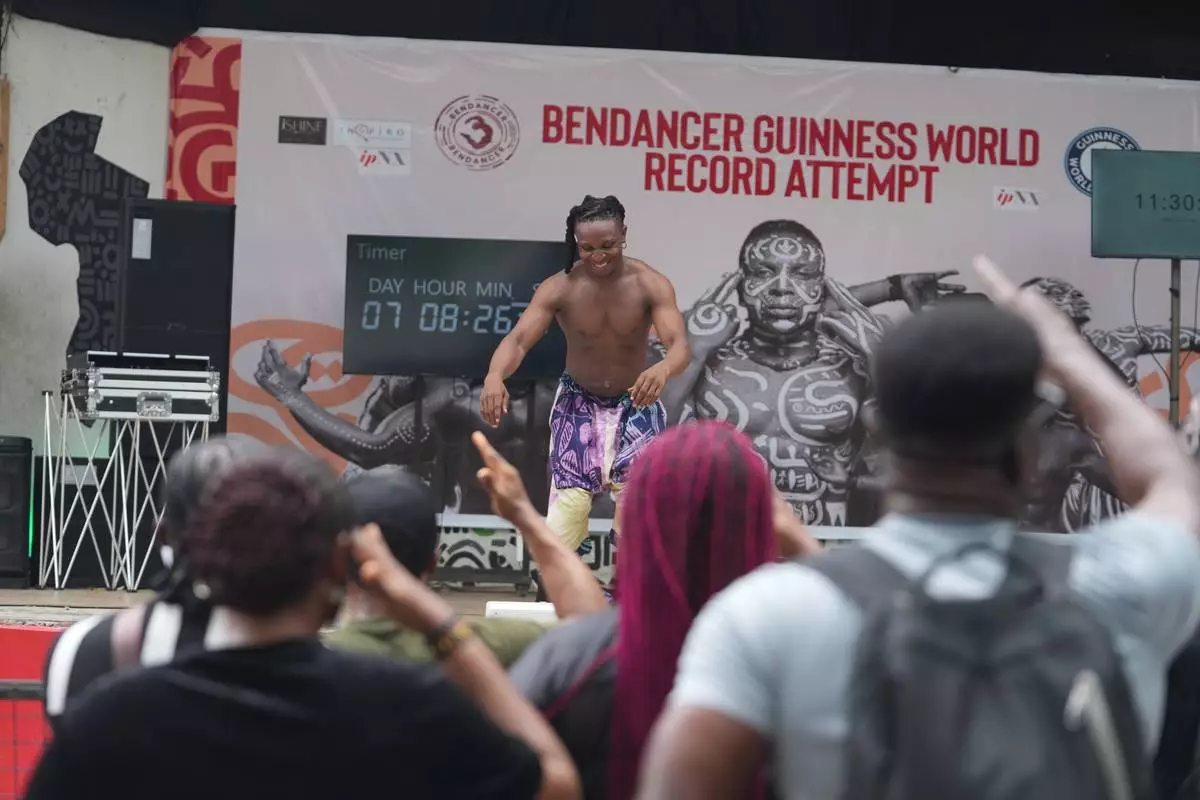 Benjamin Daniel, known as Ben Dancer, attempts dancing for 168 hours in a bid to set a Guinness World Record, at the freedom park in Lagos, Nigeria, Tuesday, Sept. 29, 2026. (AP Photo/Sunday Alamba)