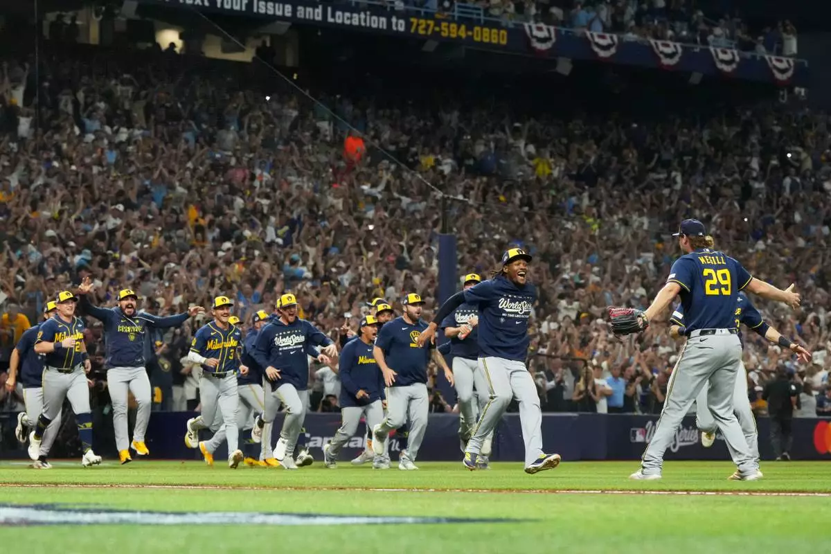 The Milwaukee Brewers celebrate after winning baseball's World Series against the Tampa Bay Rays, Wednesday, Oct. 28, 2026, in St. Petersburg, Fla. (AP Photo/Ashley Landis)