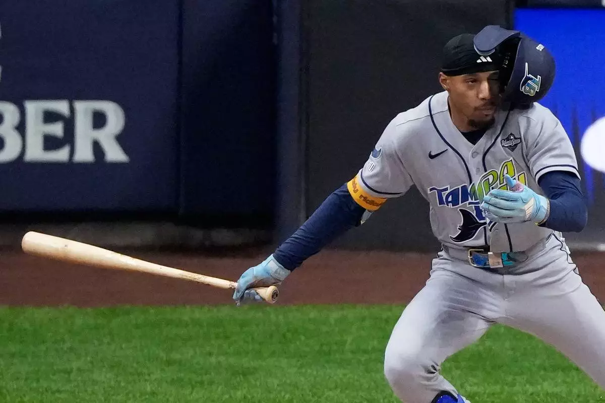 Tampa Bay Rays left fielder Chandler Simpson singles during the first inning of Game 1 of baseball's World Series, Friday, Oct. 23, 2026, in Milwaukee, between the Milwaukee Brewers and the Tampa Bay Rays. (AP Photo/David J. Phillip)