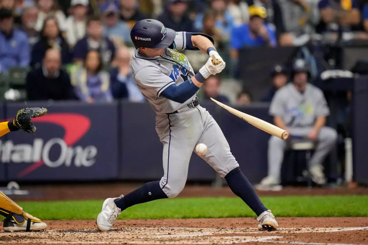 Tampa Bay Rays second baseman Ben Williamson breaks his bat during the fifth inning of Game 1 of baseball's World Series, Friday, Oct. 23, 2026, in Milwaukee, between the Milwaukee Brewers and the Tampa Bay Rays. (AP Photo/Ashley Landis)