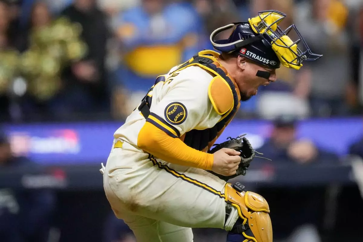 Milwaukee Brewers catcher William Contreras celebrates the final out of Game 2 of baseball's World Series, Saturday, Oct. 24, 2026, in Milwaukee, between the Milwaukee Brewers and the Tampa Bay Rays. (AP Photo/Ashley Landis)