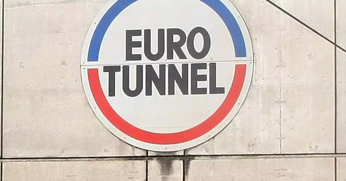 Minibus slams into Channel Tunnel shuttle train, injuring 19 and halting service