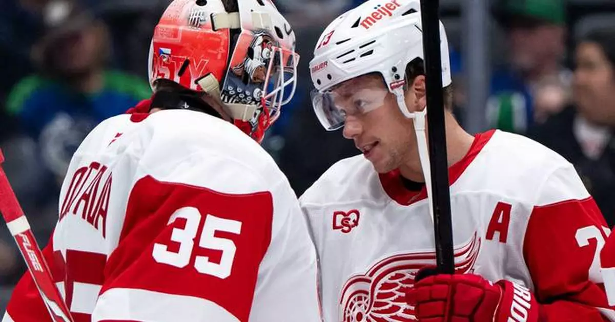Raymond scores twice in the Red Wings' 5-2 victory over the Canucks