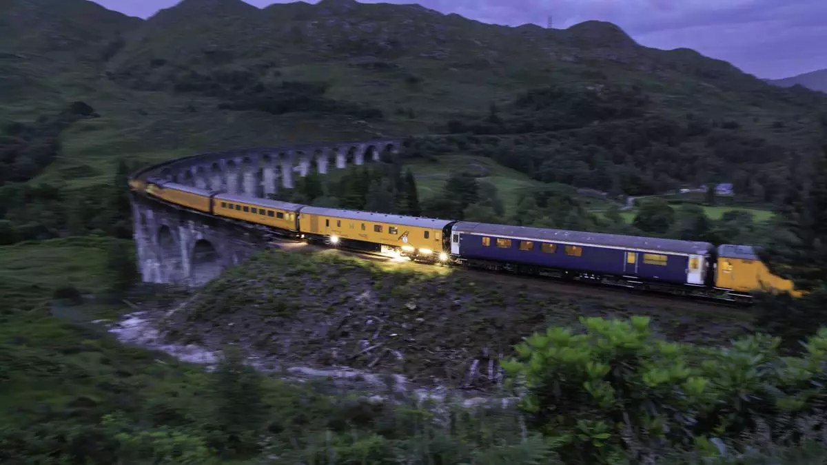 Network Rail's ultrasonic test unit fitted with Machines With Vision’s RailLoc sensor crossing Glenfinnan Viaduct
