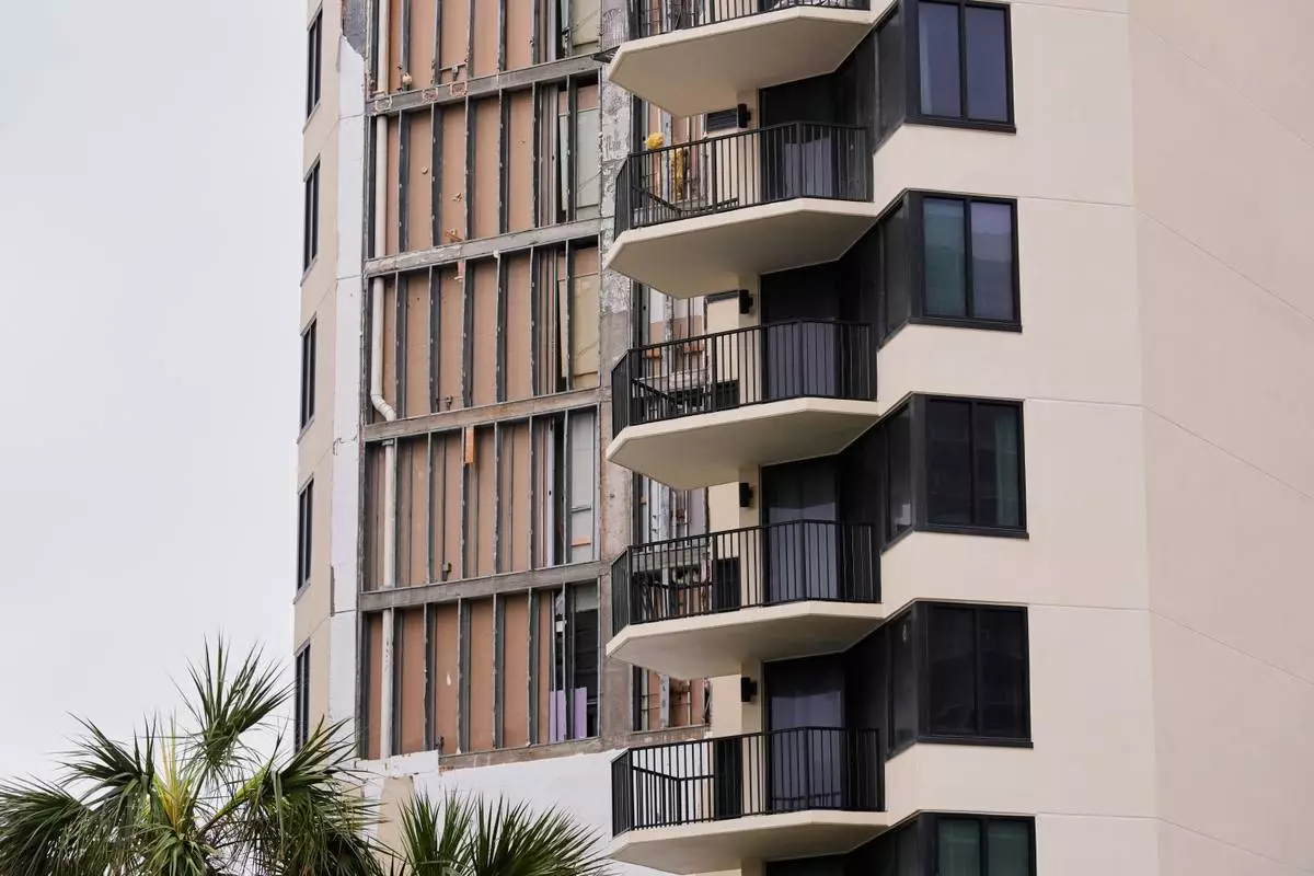Damage is seen on a condominium high-rise from Hurricane Isaias in Panama City Beach, Fla., Saturday, Oct. 10, 2026. (AP Photo/Gerald Herbert)