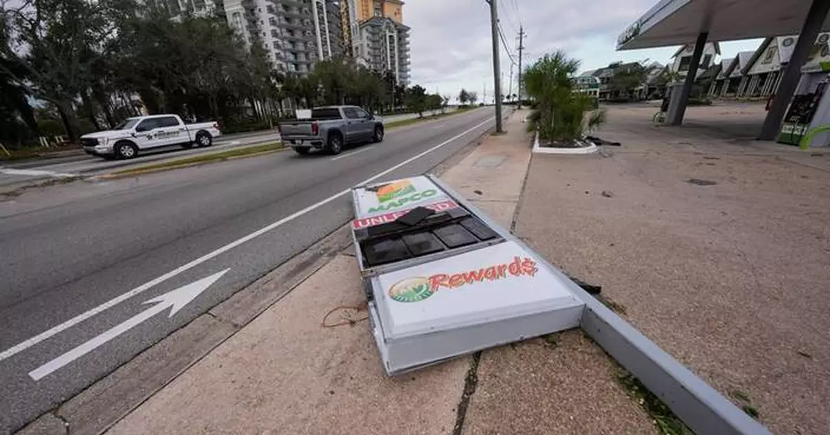 The Latest: Isaias weakens after making landfall as Category 2 hurricane