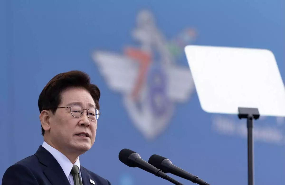 South Korean President Lee Jae Myung delivers a speech during the Armed Forces Day at a military base in Gyeyong, South Korea, Thursday, Oct. 1, 2026. (Jeon Heon-kyun/Pool Photo via AP)