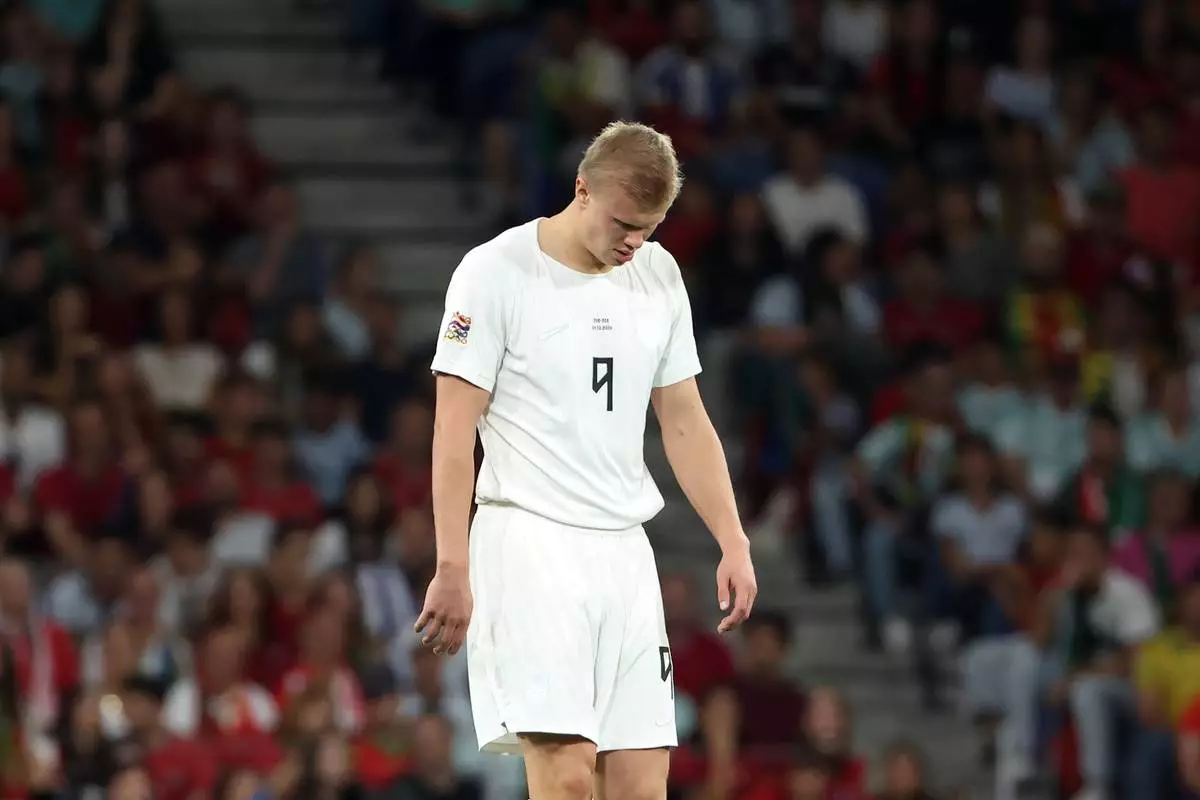 Norway's Erling Haaland reacts during the Nations League soccer match between Portugal and Norway in Porto, Portugal, Sunday, Oct. 4, 2026. (AP Photo/Luis Vieira)