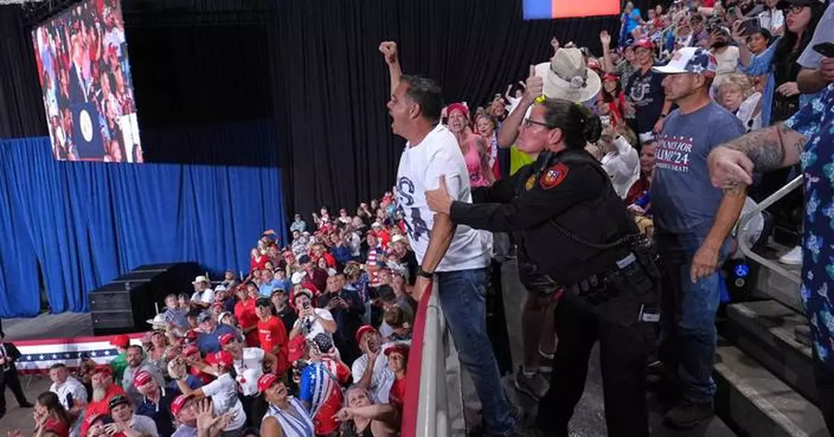 Trump interrupted by protesters as he fights to rally Texas voters behind Paxton in US Senate race