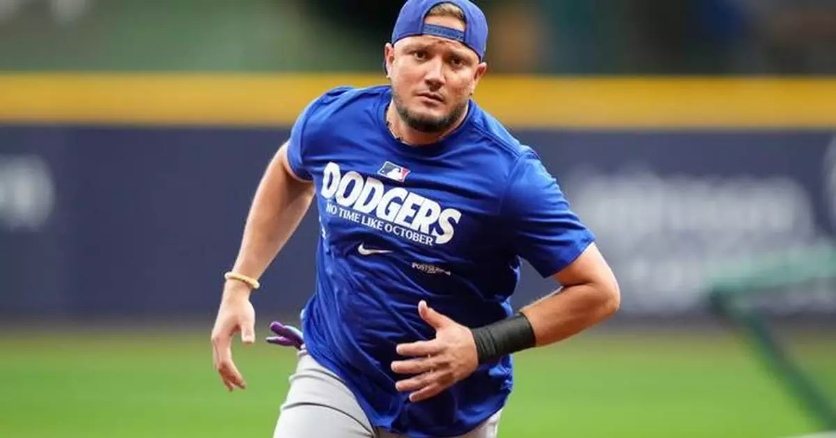 Dodgers keep infielder Miguel Rojas on their NLCS roster against the Brewers