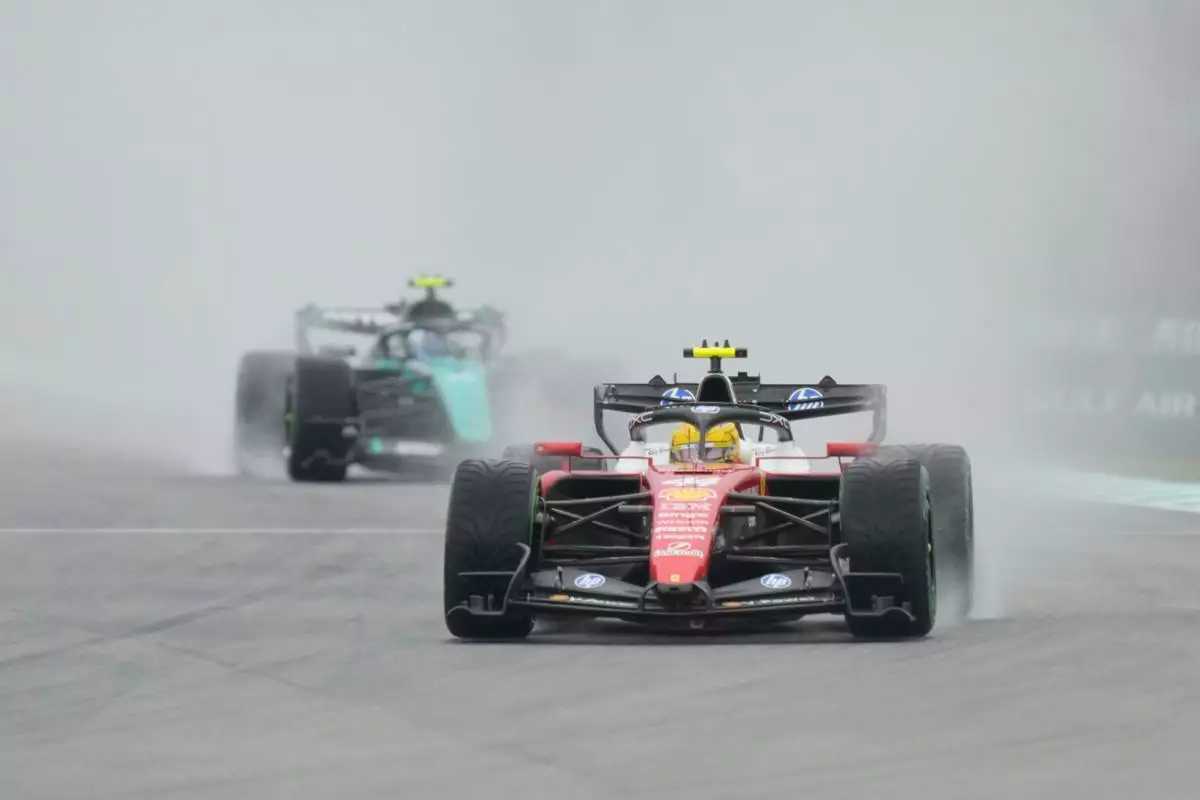 Ferrari driver Lewis Hamilton of Britain steers his car during the formation lap prior to the delayed start of the Bahrain Grand Prix in Sepang, Malaysia, Sunday, Oct. 4, 2026. (AP Photo/Aijaz Rahi)