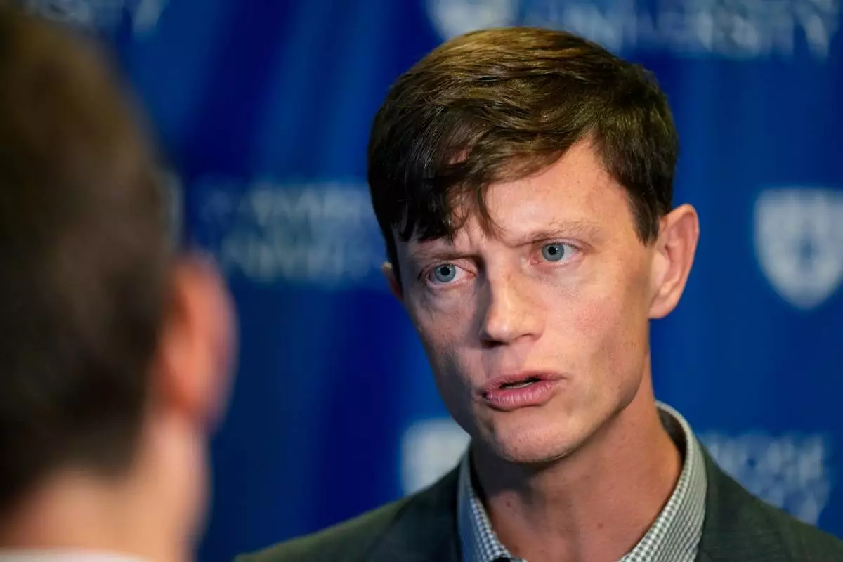 Democratic gubernatorial candidate Rob Sand speaks to the media after a debate hosted by KWQC, Tuesday, Oct. 6, 2026, at St. Ambrose University in Davenport, Iowa. (AP Photo/Charlie Neibergall)