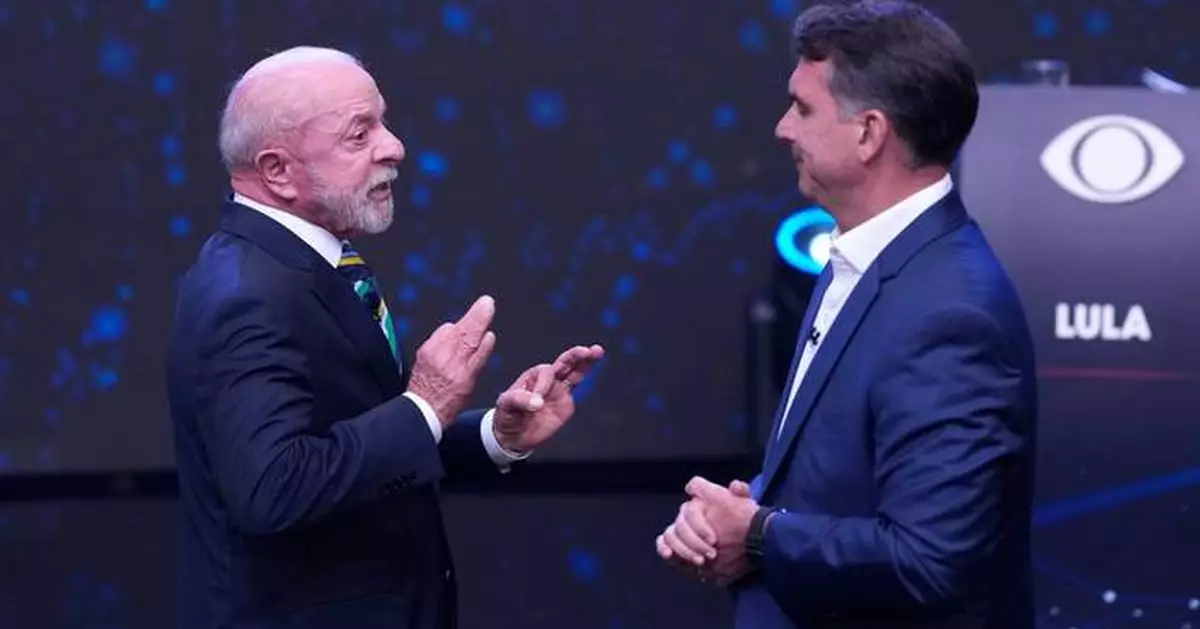 Brazil's Lula and Flávio Bolsonaro trade barbs in 1st debate only days before presidential runoff