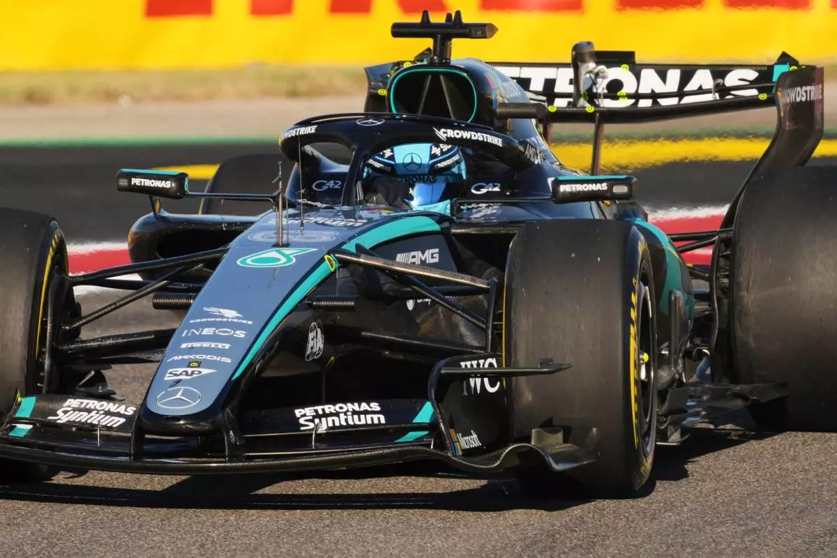 Mercedes driver George Russell of Britain steers his car into a turn during the second practice session for the Formula One United States Grand Prix auto race at Circuit of the Americas in Austin, Texas, Friday, Oct. 23, 2026. (AP Photo/Eric Gay)