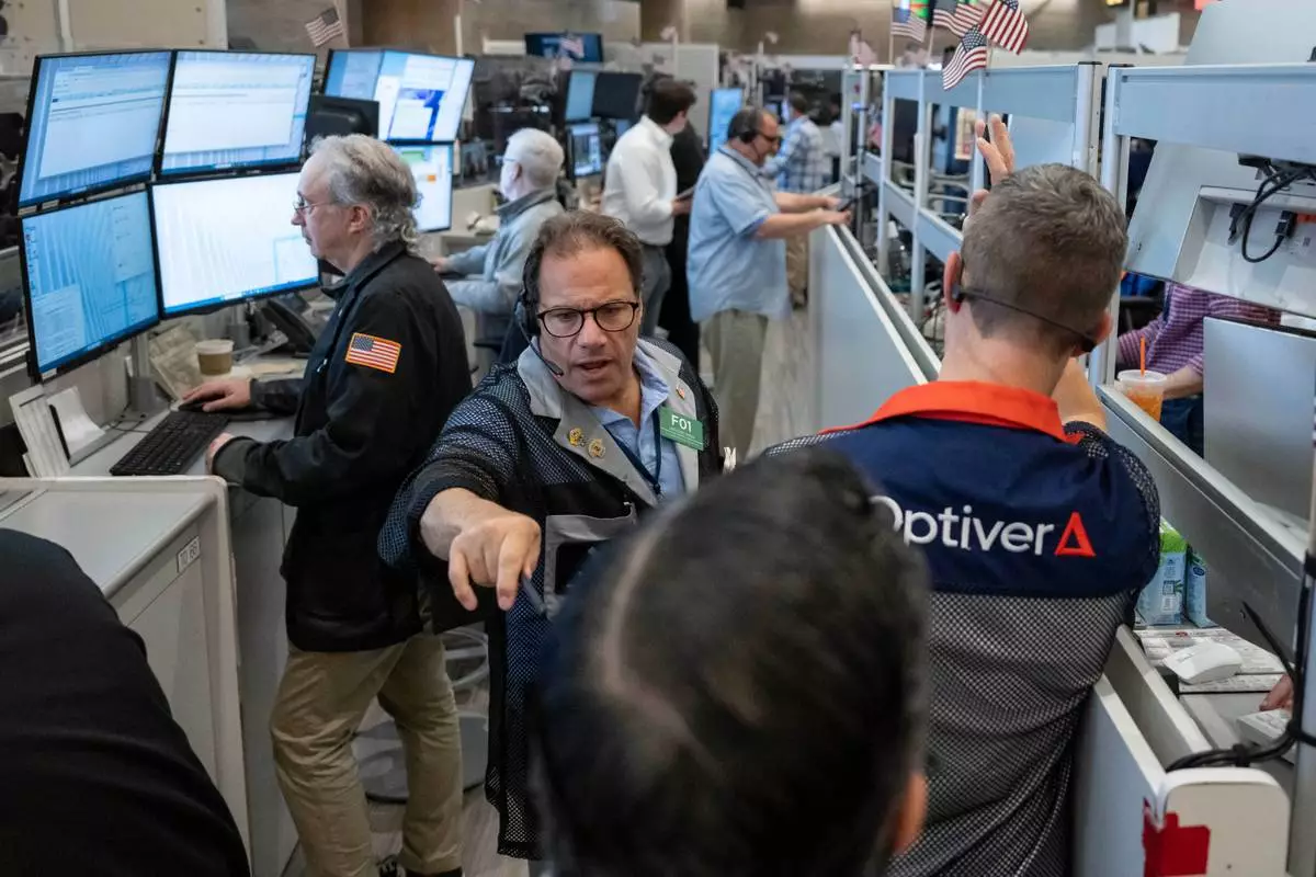 Options trader Anthony Spina works on the floor of the New York Stock Exchange, Thursday, Oct. 8, 2026, in New York. (AP Photo/Yuki Iwamura)