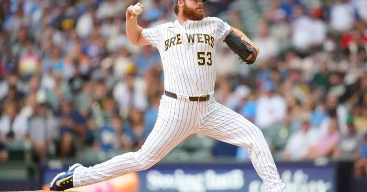 Milwaukee pitcher Brandon Woodruff isn't ruling out possible World Series return if Brewers make it