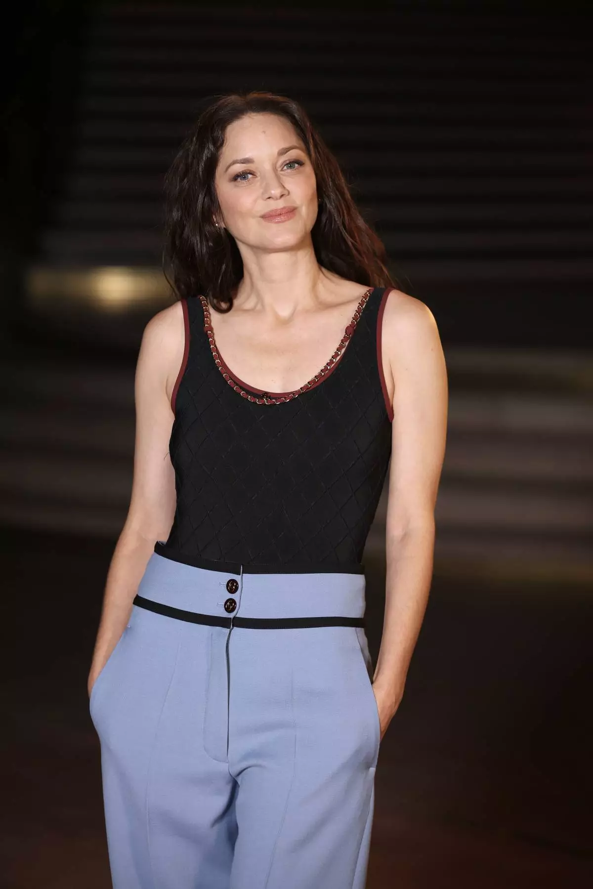 Marion Cotillard poses upon arrival at the Chanel Womenswear Spring Summer 2027 collection presented in Paris, France, Monday, Oct. 5, 2026. (AP Photo/Thomas Padilla)