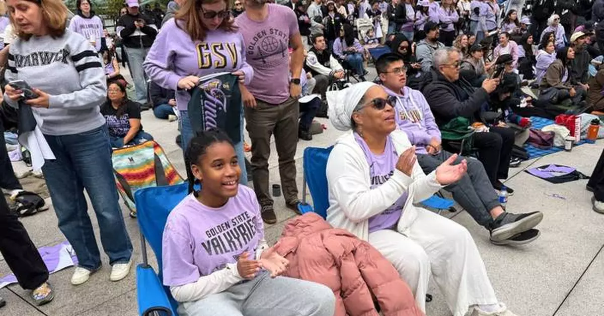 Young girls skip school with their parents to attend Valkyries' early WNBA Finals watch party