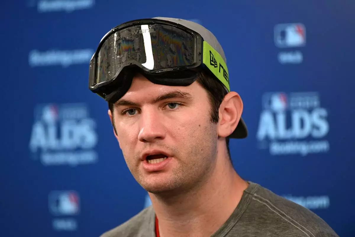Cleveland Guardians pitcher Gavin Williams speaks during a news conference after Game 5 of baseball's American League Division Series against the Chicago White Sox, Saturday, Oct. 10, 2026, in Cleveland. (AP Photo/Phil Long)