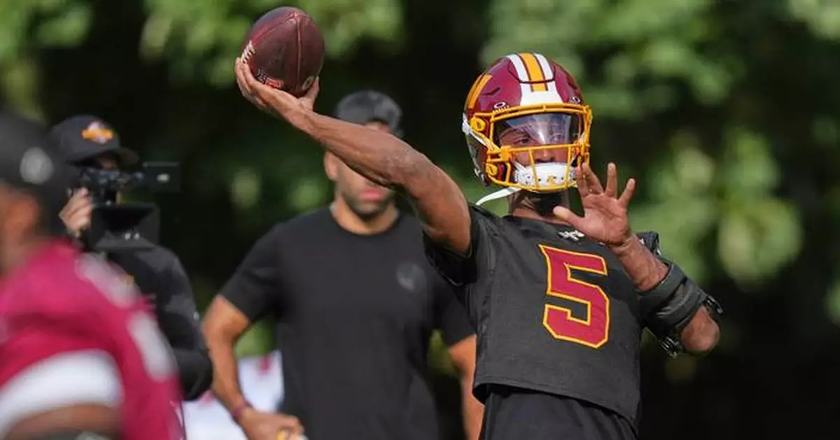 Jayden Daniels pledges to 'embrace the brace' on left arm as Commanders QB returns to practice