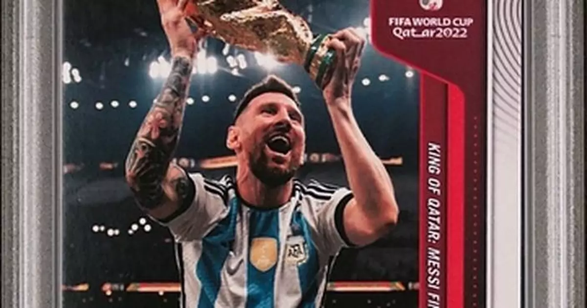 REPLICA TROPHY FROM ARGENTINA'S 2022 CHAMPIONSHIP CELEBRATION AND MESSI TRADING CARD HEAD TO AUCTION