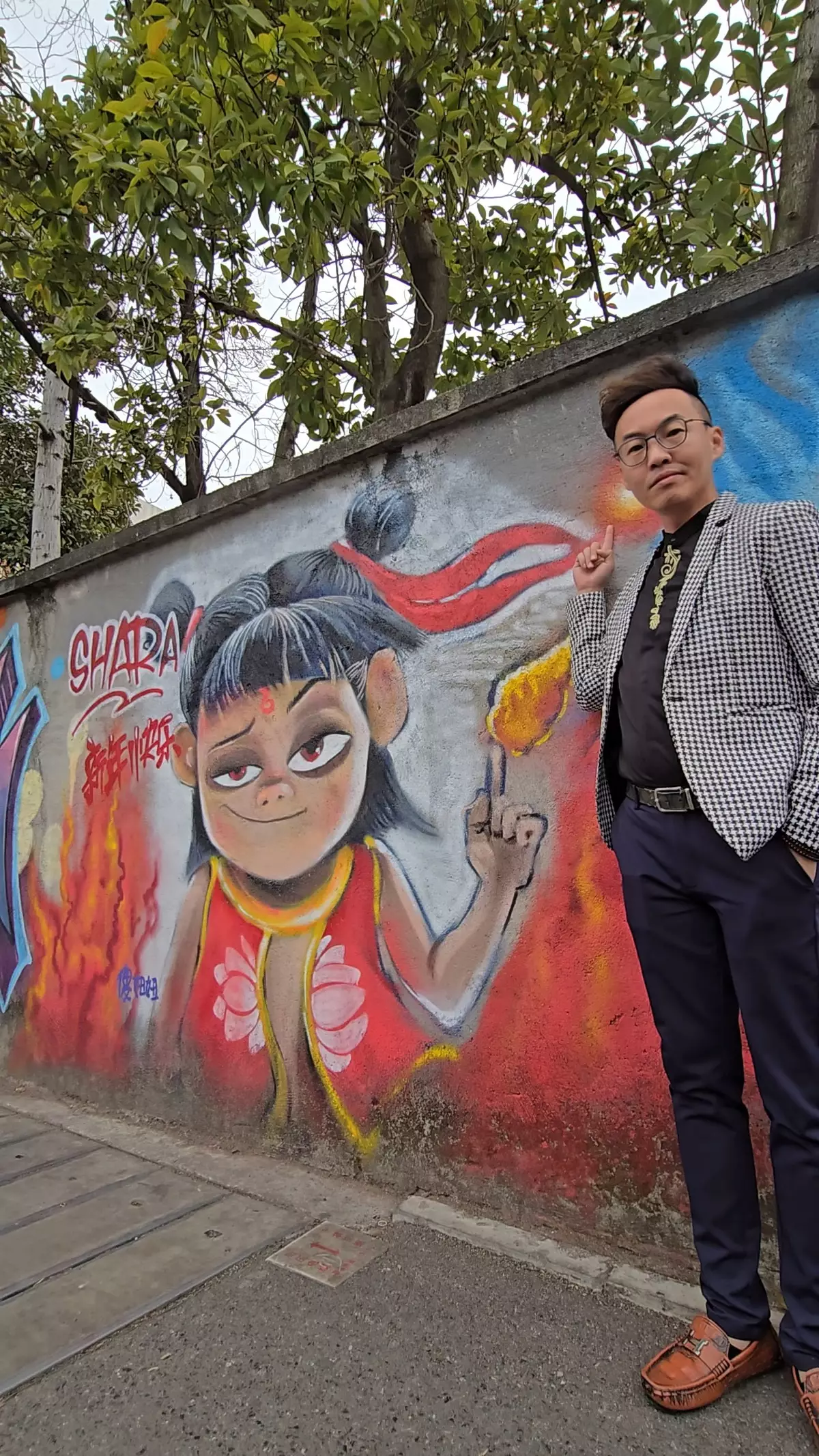 《哪咤2》在聯合國舉行特別放映 進入全球影史票房前9 深圳街頭驚現哪咤2塗鴉墻